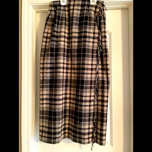 Flannel skirt calf length. Lined in black. Size 10